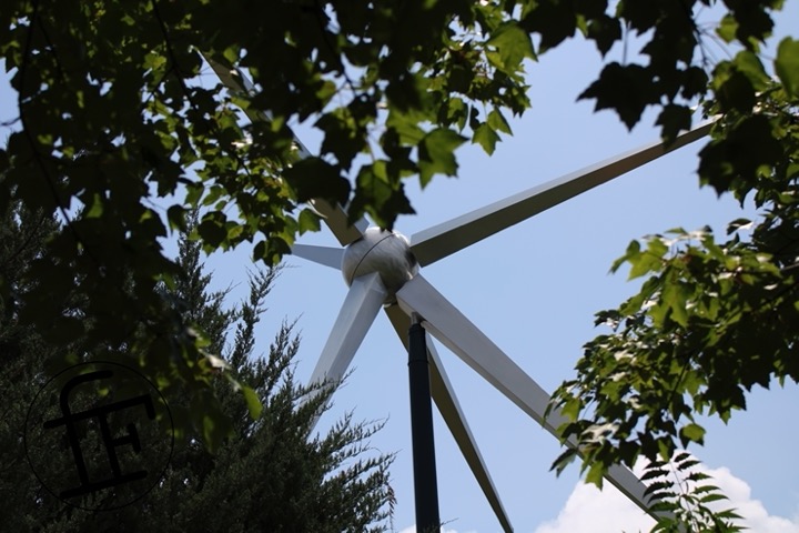 a tall metal star-like sculpture.